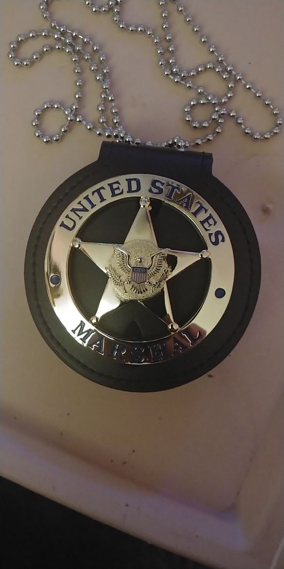 Customer photo review of US Federal Court Law Enforcement Marshal Gold Badge Replica Movie Props