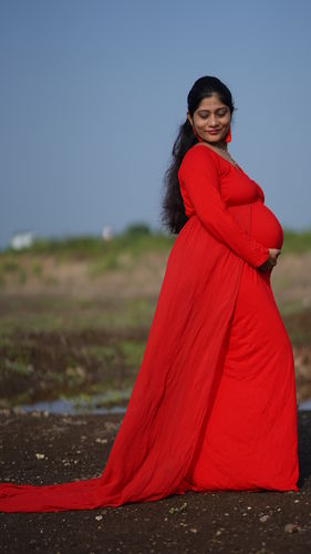 Customer photo review of Exclusive Cherry Red Trail Maternity Photoshoot Gown