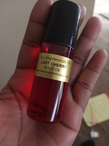 Customer photo review of Lost Cherry Type Body Oil Roll On - Unisex
