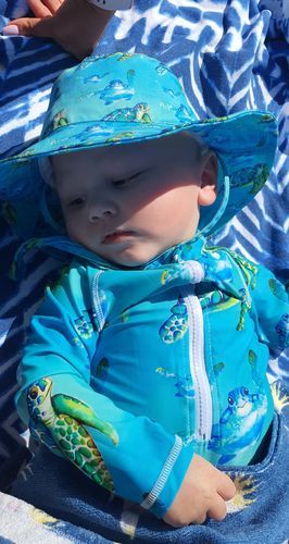Customer photo review of PRE-ORDER Blue Turtle Unisex Long Sleeve Zip Swimmers