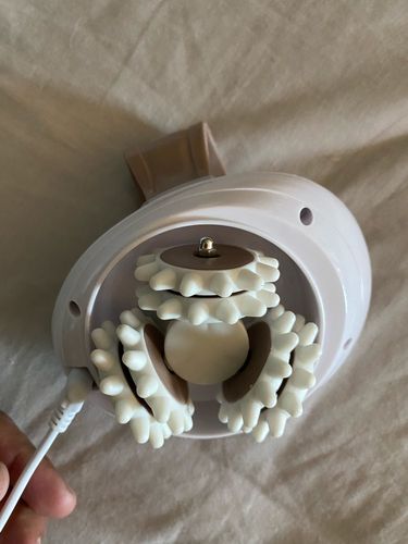 Customer photo review of 3D Electric Handheld Full Body Massage Roller Anti-Cellulite Slimming Massage Device