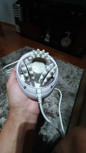 Customer photo review of 3D Electric Handheld Full Body Massage Roller Anti-Cellulite Slimming Massage Device