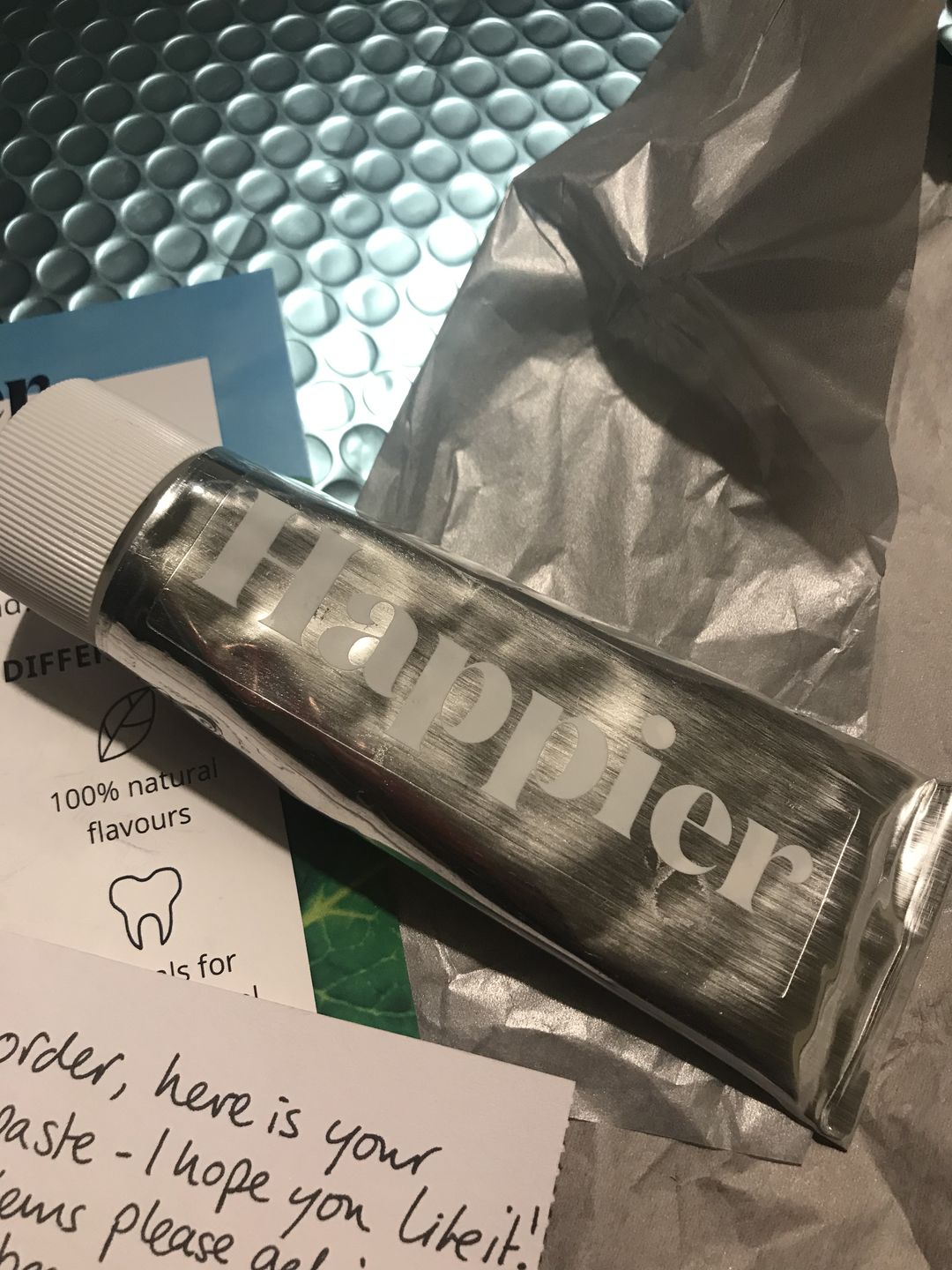 Customer photo review of 4 Pack Happier Toothpaste