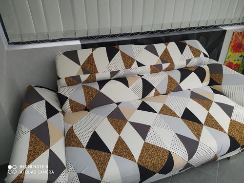 Customer photo review of Modern brown - Housses Extensibles de Fauteuil et Canapé - La Maison des Housses