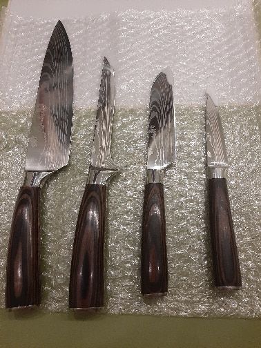 Customer photo review of Imperial Collection — Japanese High-Carbon Steel Knife Set with Damascus Pattern