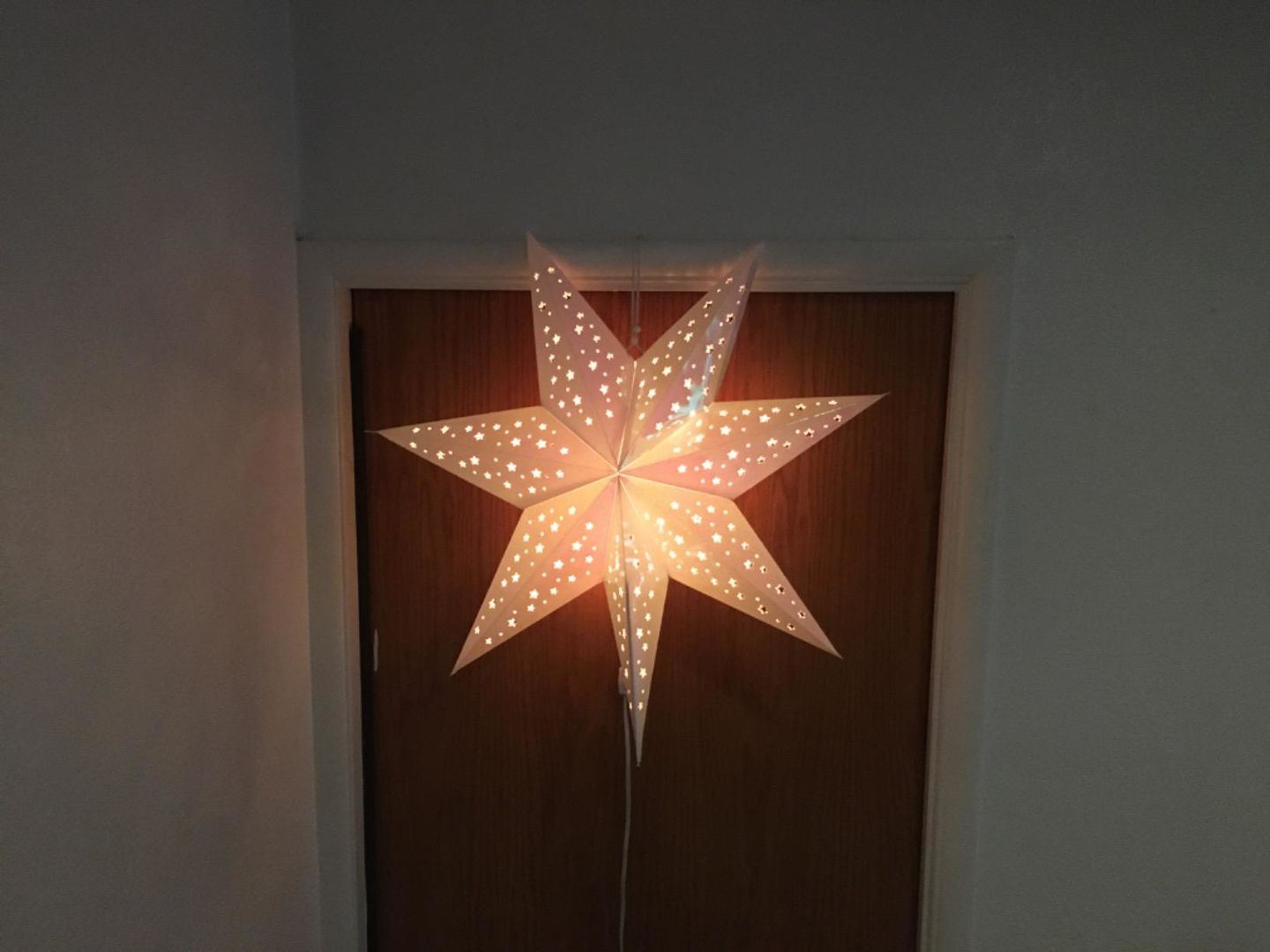 Customer photo review of Prismatic Paper Star Lantern Decoration (22 inch Rainbow Iridescent 7-Point Lighted Star)