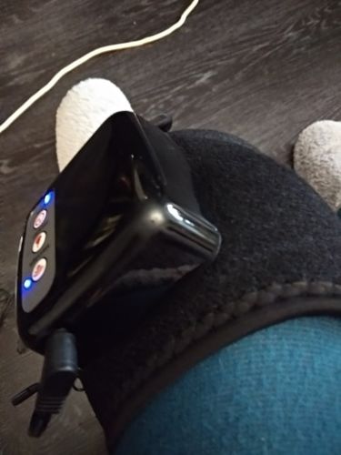 Customer photo review of Electric Heated Knee & Joint Massager Brace for Arthritis and Pain Relief
