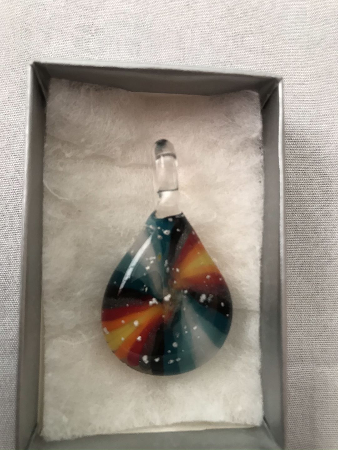 Customer photo review of Tie Dye Pendant with Infused Cremation Ashes