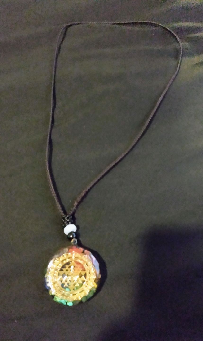 Customer photo review of Sacred Sri Yantra Orgonite Chakra Necklace