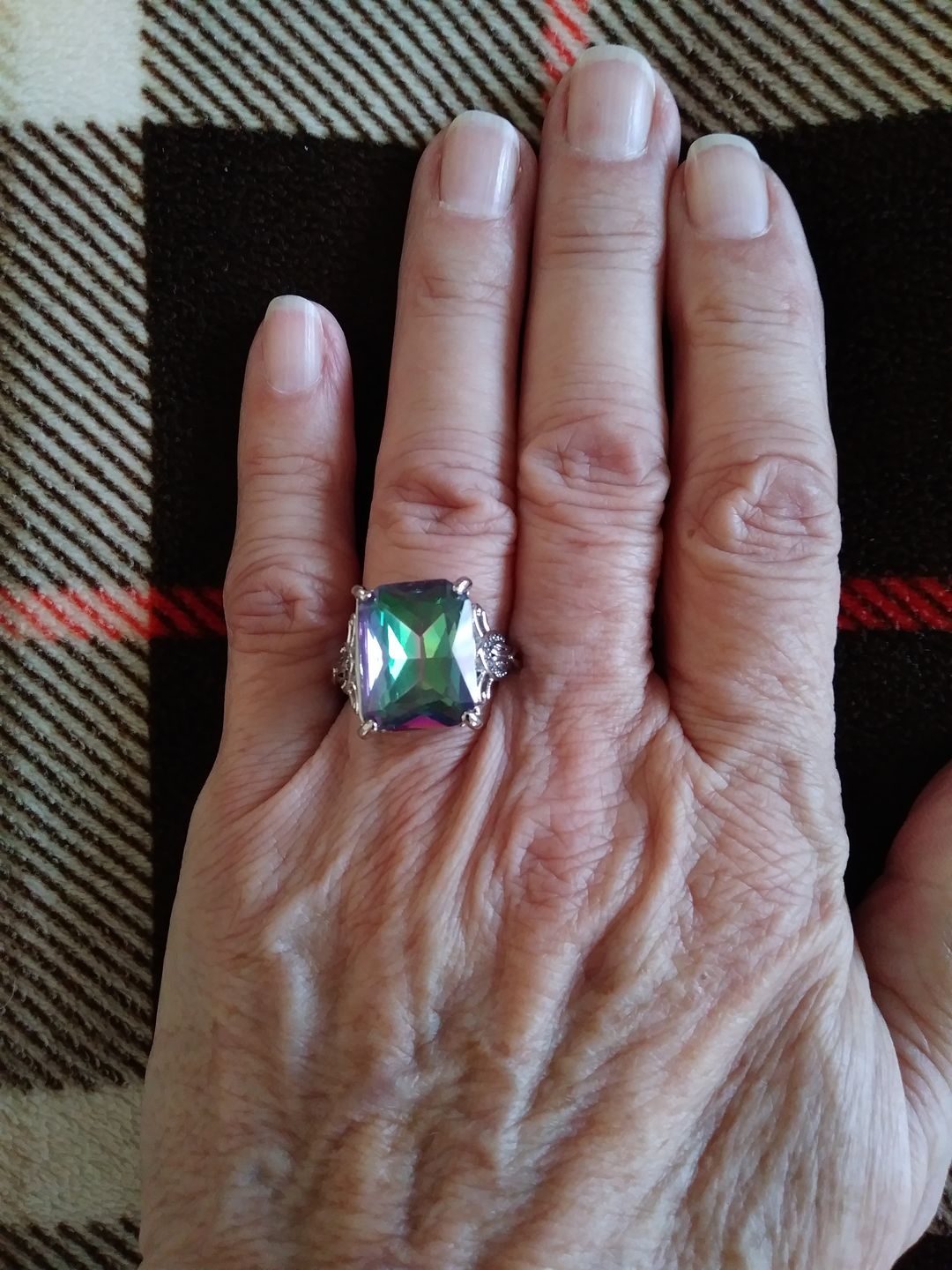 Customer photo review of Enormous Rainbow Mystic Topaz Ring