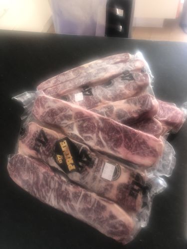 Reseña con foto de un cliente sobre Tablita de lomo
