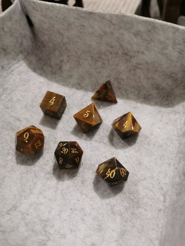 Customer photo review of URWizards Dnd Tiger's Eye Gemstone Engraved Dice Set