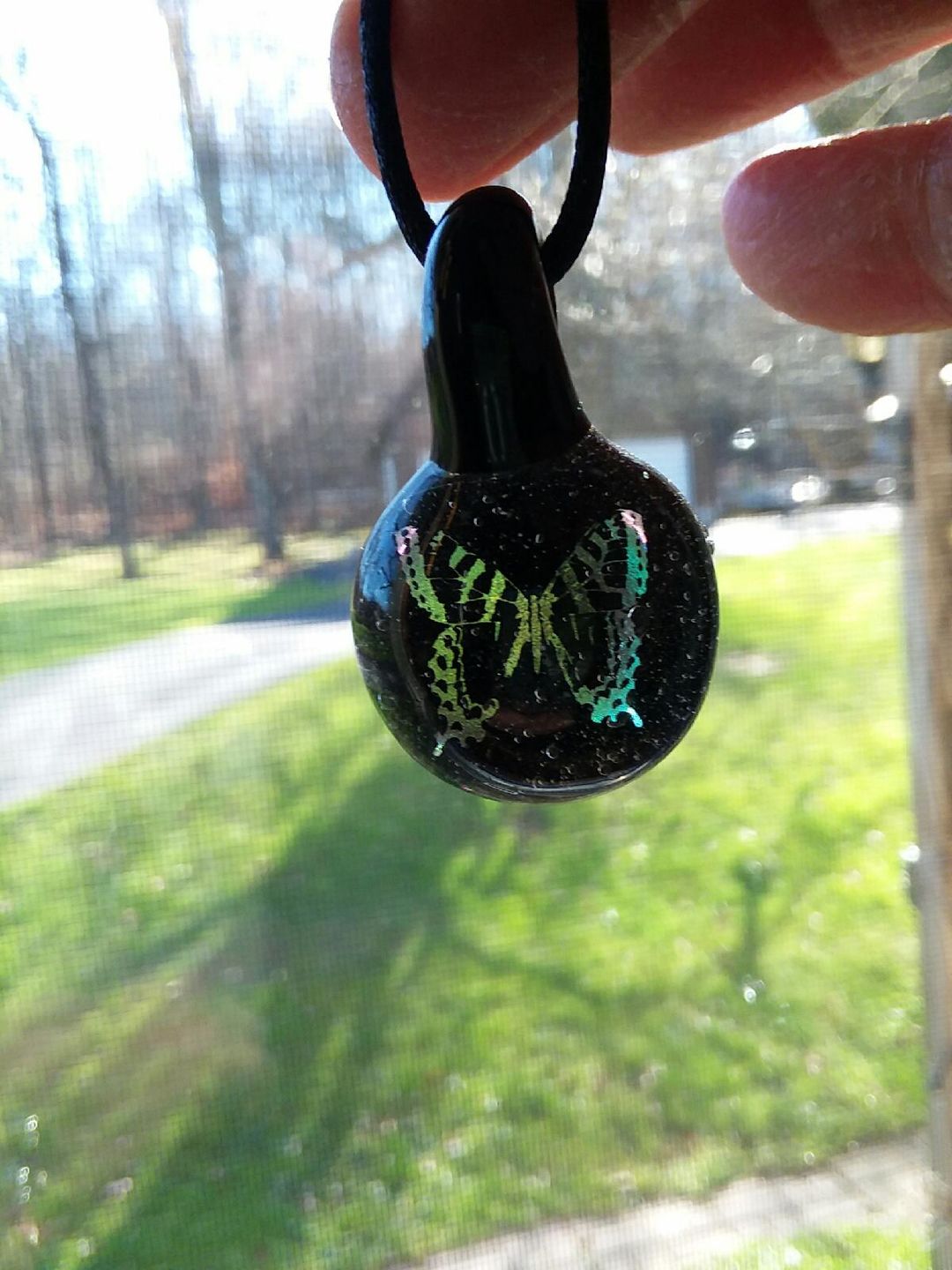 Customer photo review of Butterfly Hologram Pendant with Infused Cremation Ash