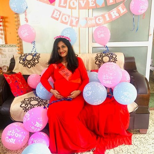 Customer photo review of Exclusive Cherry Red Trail Maternity Photoshoot Gown