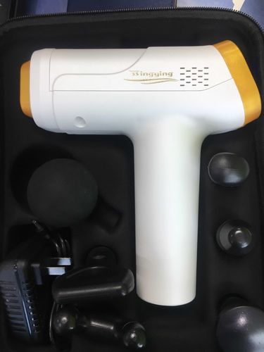 Customer photo review of 20 Speed LCD Display Muscle Massager Gun With 6 Massage Heads - More Colors