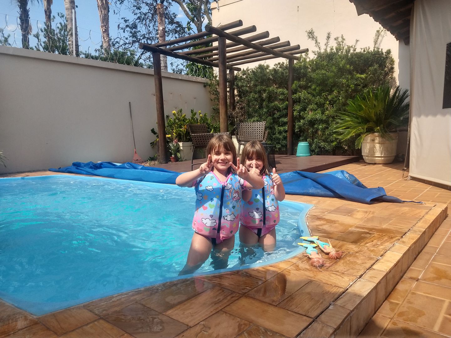 Customer photo review of Camisa Flutuadora Infantil Floater