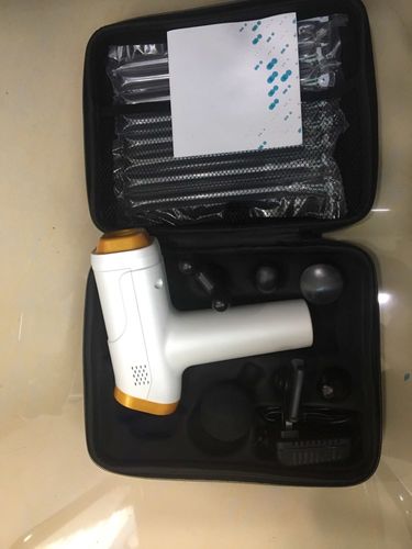 Customer photo review of 20 Speed LCD Display Muscle Massager Gun With 6 Massage Heads - More Colors