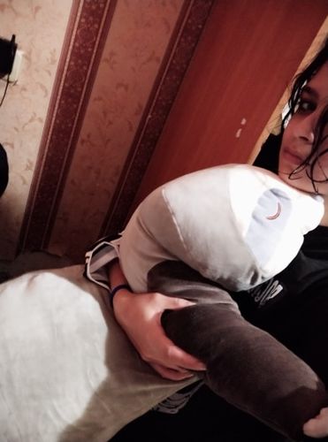 Customer photo review of Sleepy Sloth Plush