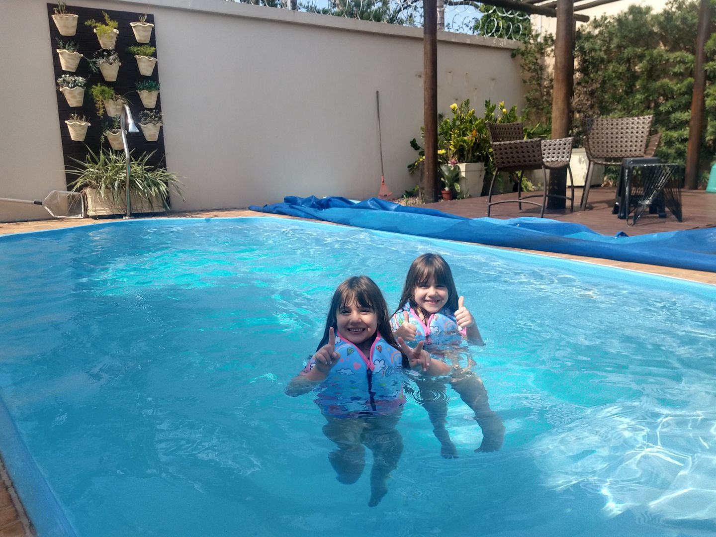 Customer photo review of Camisa Flutuadora Infantil Floater