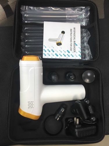 Customer photo review of 20 Speed LCD Display Muscle Massager Gun With 6 Massage Heads - More Colors