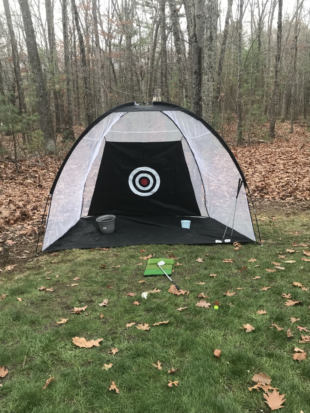 Customer photo review of Golf Practice Driving Net for Indoors and Outdoors | Tri-Turf Hitting Mat