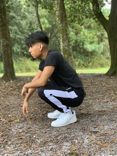 Customer photo review of Zip Pocket Dual Stripe Track Pants (Black-White)