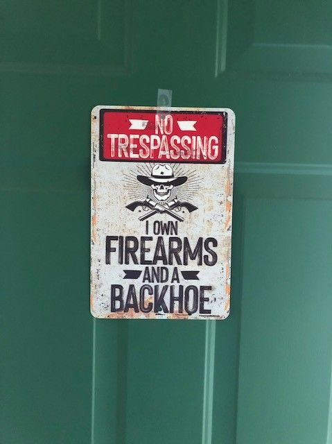 Customer photo review of Dogs Welcome People Tolerated - Metal Sign