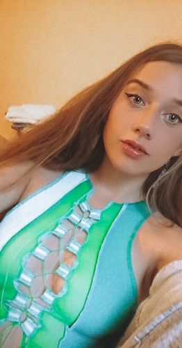 Customer photo review of Sleeveless sheer lace up crop top