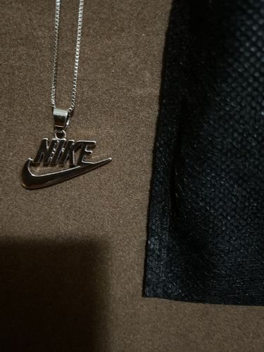 Customer photo review of Swoosh Necklace