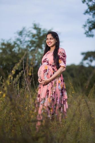 Customer photo review of Luxe Peach Rouge Maternity Flow Dress