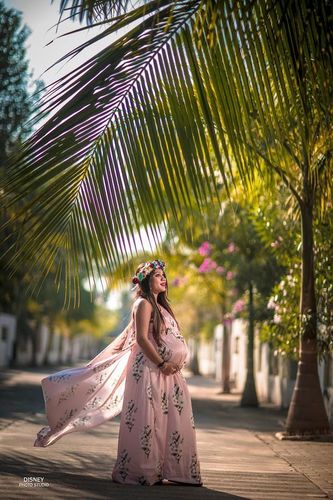 Customer photo review of Luxe Carnation Pink One Shoulder Floral Maternity Gown