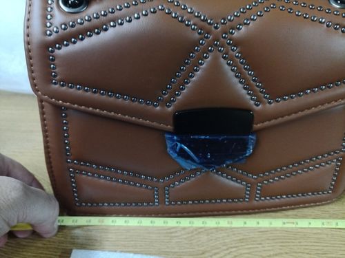 Customer photo review of Rivet Crossbody Bag