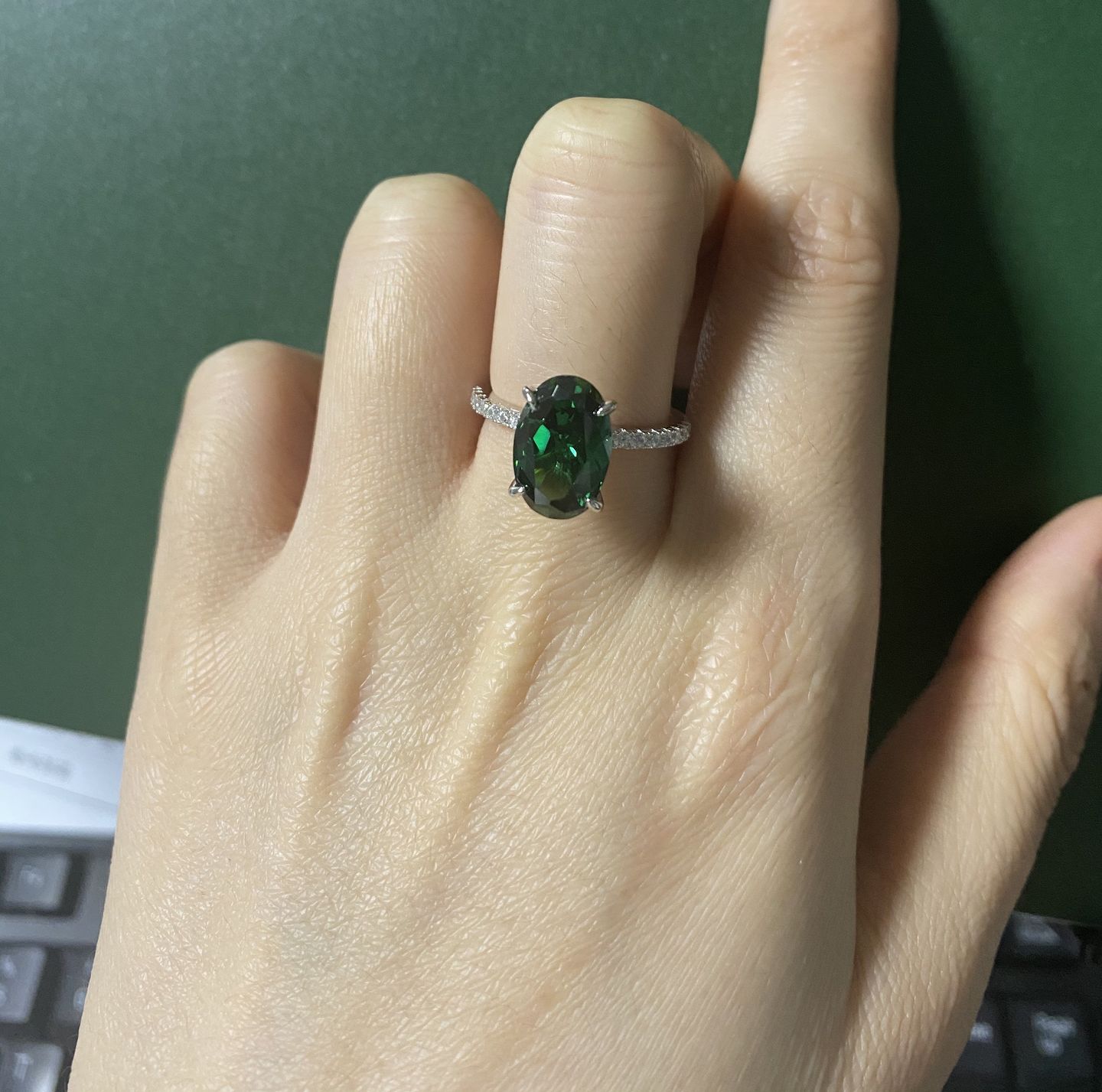 Customer photo review of Louily Classic Oval Cut Emerald Green Simulated Diamond Engagement Ring In Sterling Silver