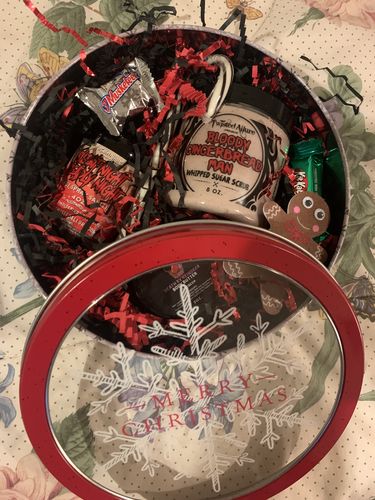 Customer photo review of Small gray and red snowflake round Tin