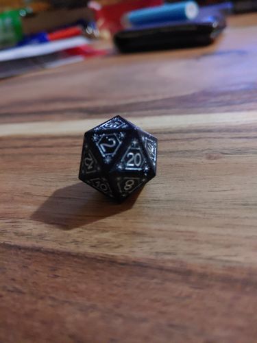 Customer photo review of URWizards Dnd Engraved Blue Sandstone D20 Dice Astrology Style