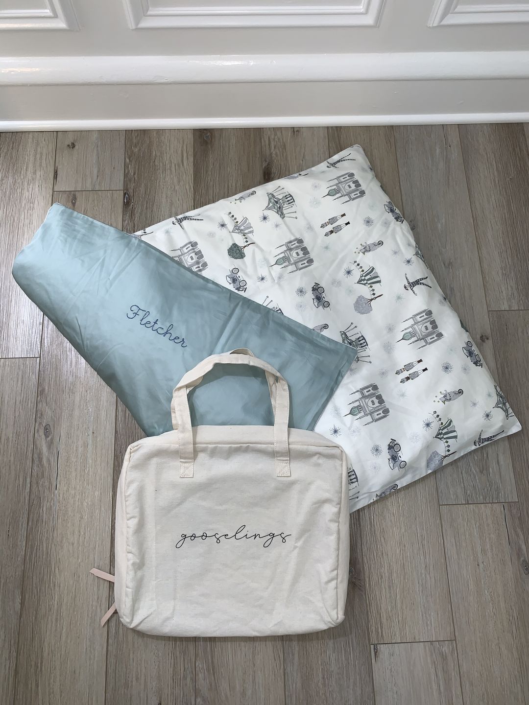 Customer photo review of Adventures in Wonderland Baby Duvet - Aqua