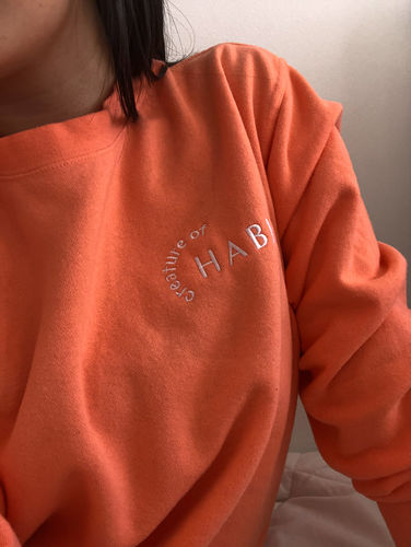Customer photo review of creature of habit crewneck