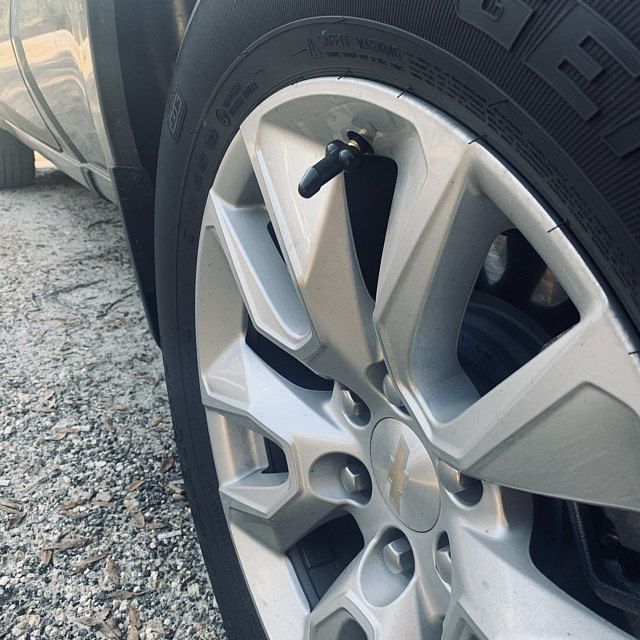 Customer photo review of Tirecockz Prank Penis Shaped Valve Stem Cap