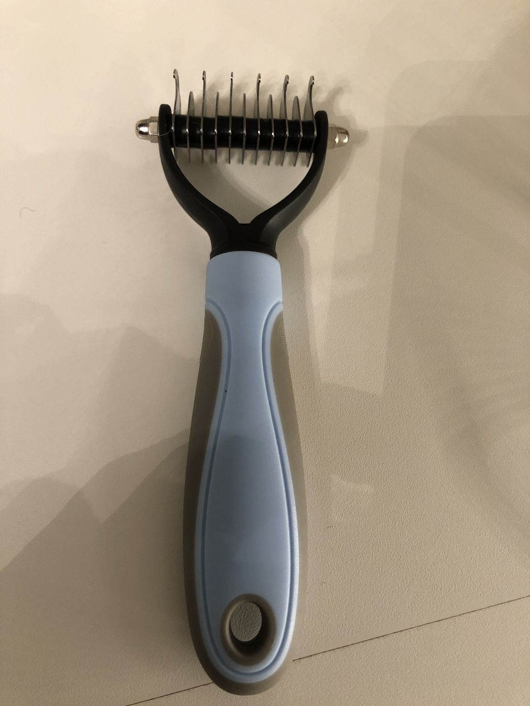 Customer photo review of Peigne de Toilettage Professionnel PuppySafe™