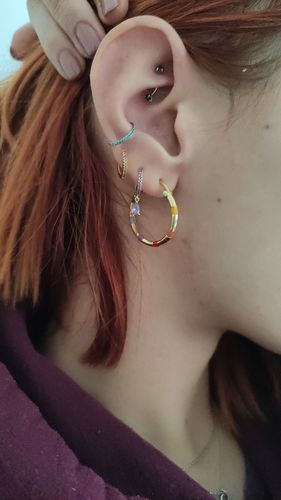 Customer photo review of Internally Threaded Gem Curved Eyebrow Ring 16g