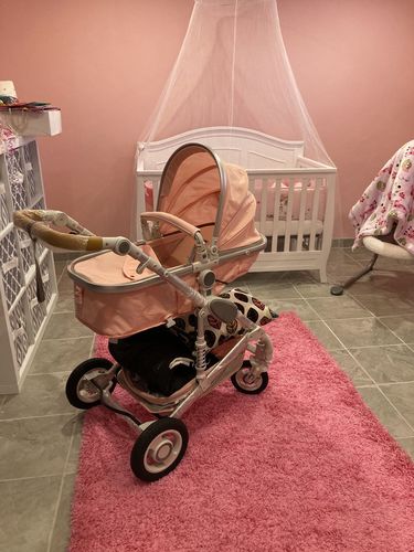 pink bassinet stroller