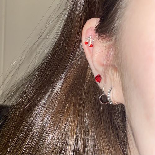 Customer photo review of Red Cherry Cartilage/Tragus Ring