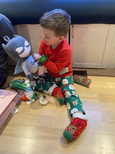 Customer photo review of Personalized Superhero Leyadoll with Gift Bag - 2 Skin Tones Boy Plush Doll Super Hero Batman