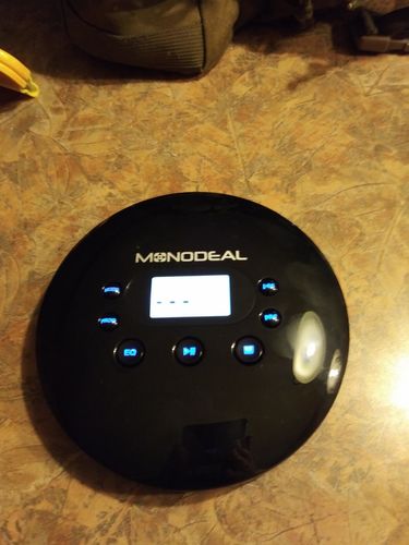 Customer photo review of Wireless TV Headphones, Monodeal Over Ear Headsets for TV Watching with Charging Dock, 2.4GHz RF Transmitter, 100ft Wireless Range and Rechargeable 20 Hour Battery, Black