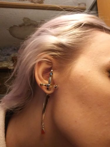 Customer photo review of Blood Sworn Dagger Stud Earrings