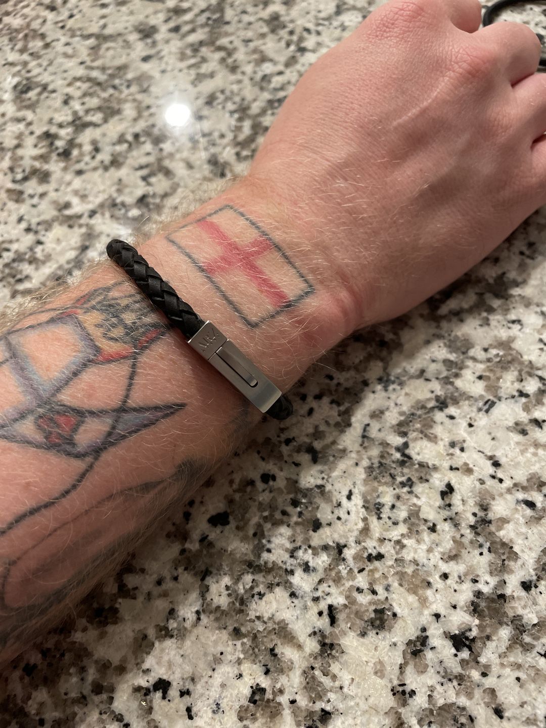 Customer photo review of 6mm Black Leather Matte Steel Clasp Engravable Bracelet