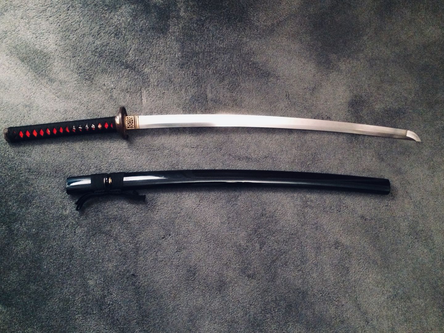 Customer photo review of Clay Tempered Folded Steel Japanese Samurai Swords FullTang Blade Handmade Sword Katana
