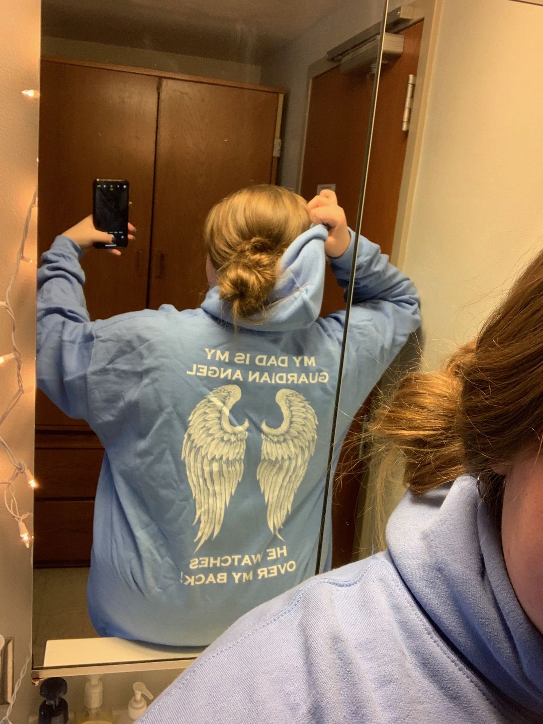 Customer photo review of My Dad Is My Guardian Angel Hoodie