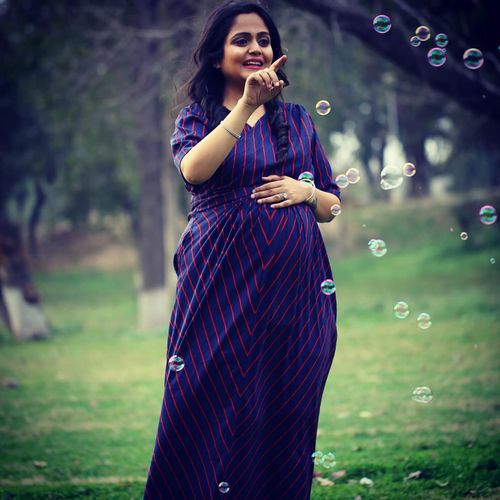 Customer photo review of Era Navy Striped Maternity & Nursing Wrap Dress