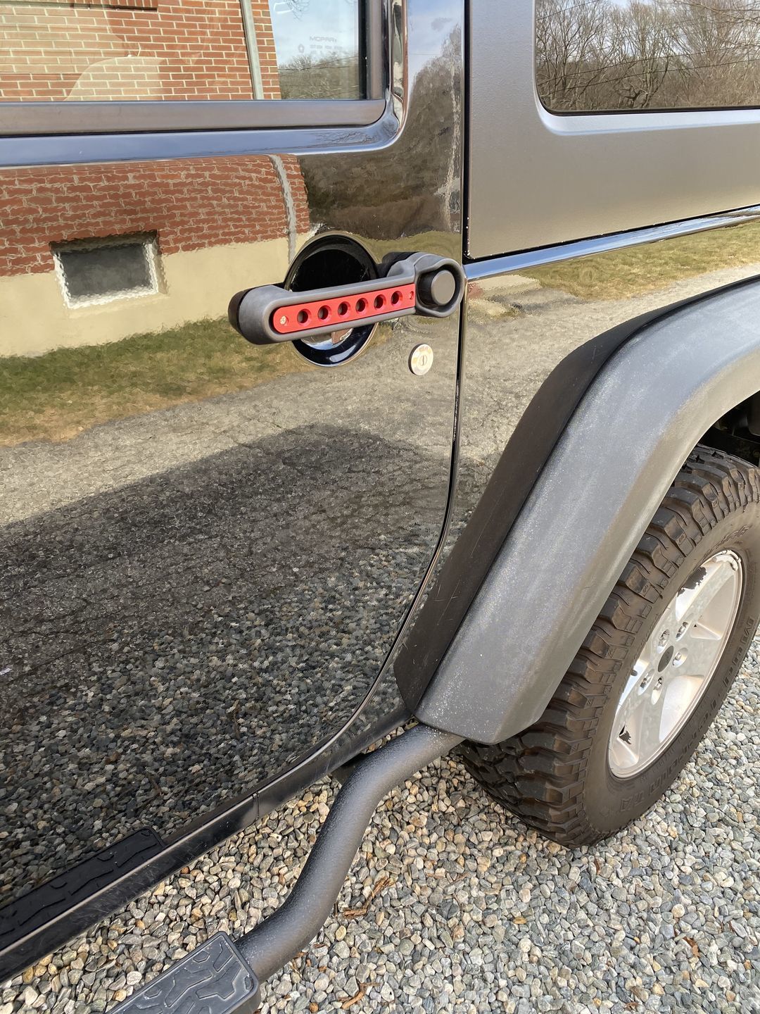 Customer photo review of Aluminum Grab Handle - Front / Rear / Black / Red (11-18 Jeep Wrangler JK/ JKU)